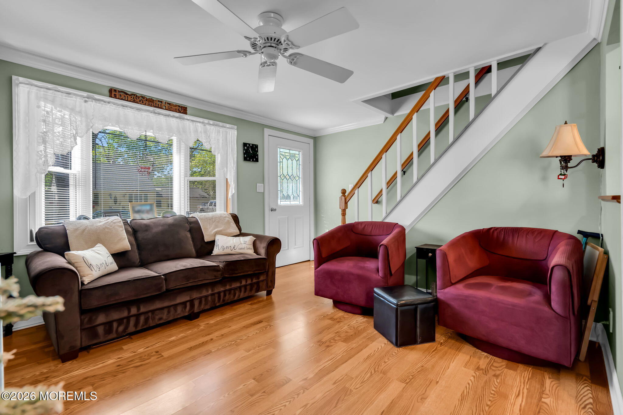 437 Shady Lane Howell, NJ 07731 - Photo 4 of 21 a living room with furniture a ceiling fan and a window