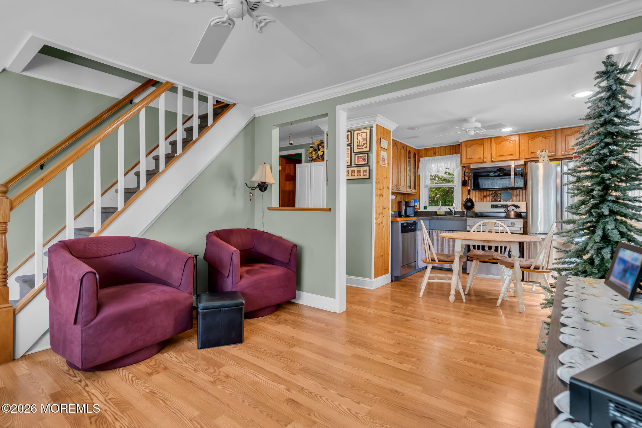 437 Shady Lane Howell, NJ 07731 - Photo 5 of 21 a living room with furniture a rug and a floor to ceiling window