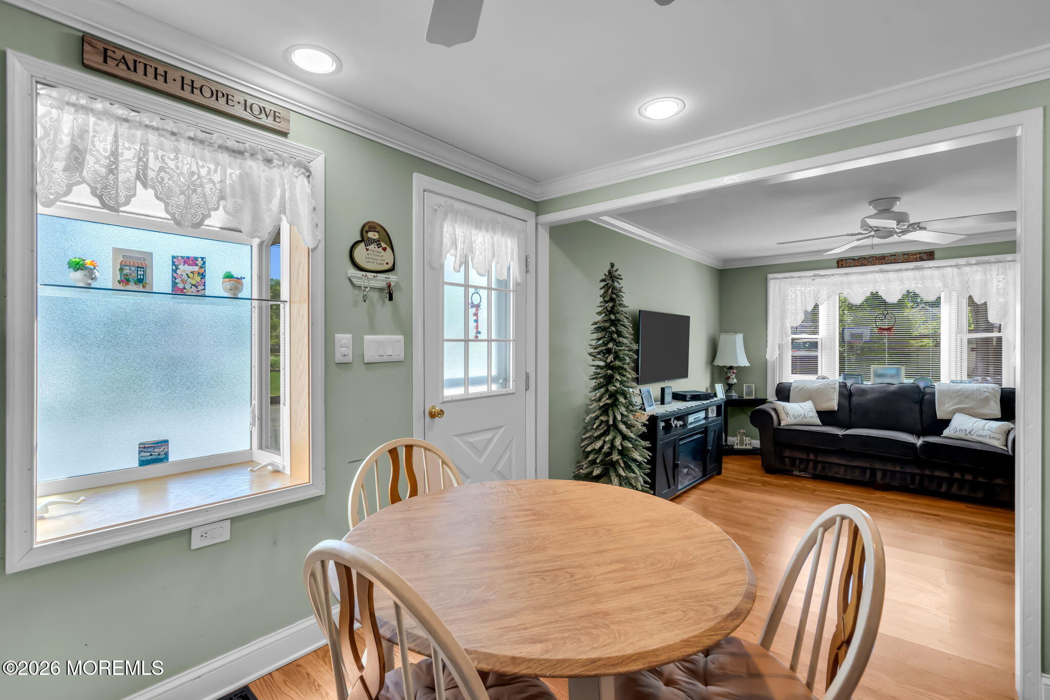437 Shady Lane Howell, NJ 07731 - Photo 8 of 21 a view of a dining room with furniture window and wooden floor