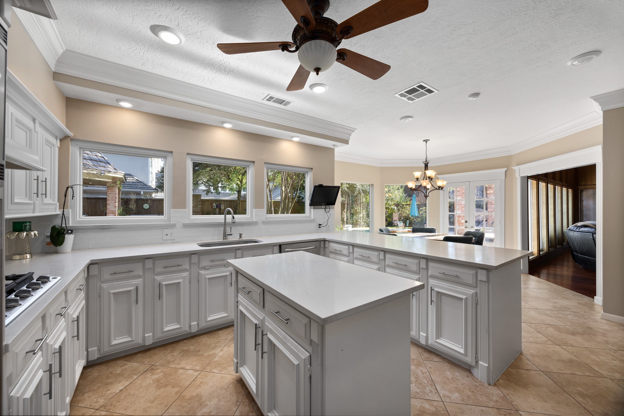 8807 Chelmsford Lane Spring, TX 77379 - Photo 15 of 50 The kitchen is light & bright with updated counters, SS appliances, double ovens & a removable island.