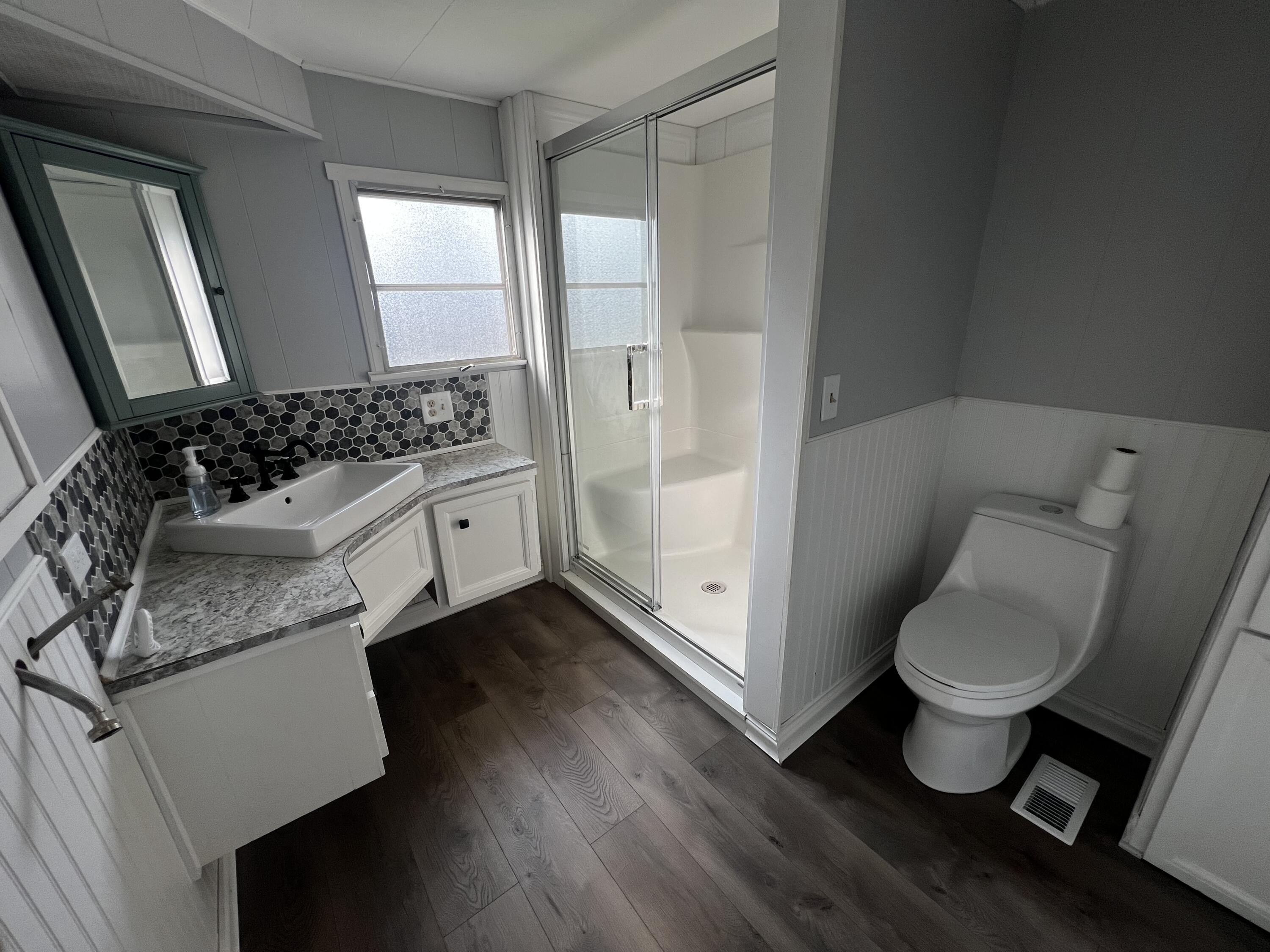 14 Joseph Street Wareham, MA 02538 - Photo 8 of 11 a bathroom with a sink toilet and shower