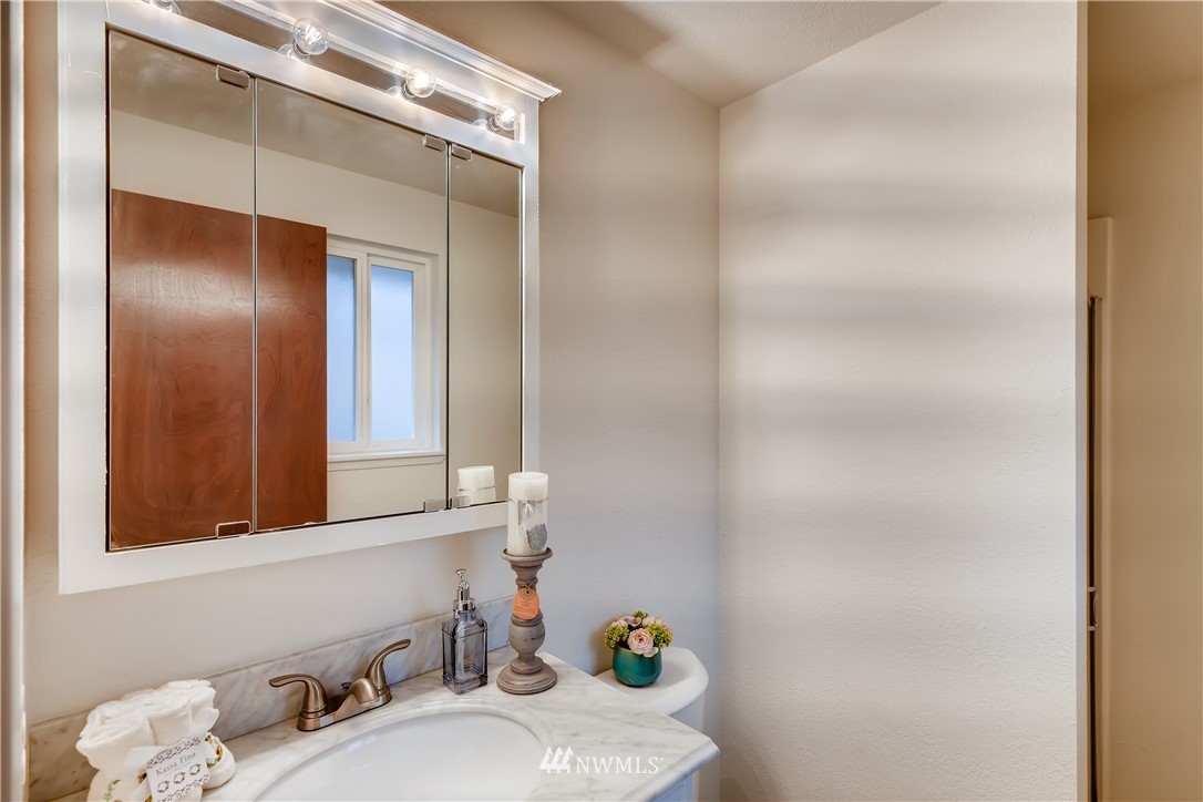 31404 3rd Place South Federal Way, WA 98003 - Photo 17 of 24 a bathroom with a sink and a mirror