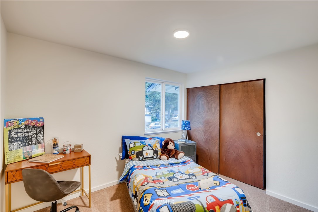 31404 3rd Place South Federal Way, WA 98003 - Photo 18 of 24 a bedroom with a bed and a dresser in it