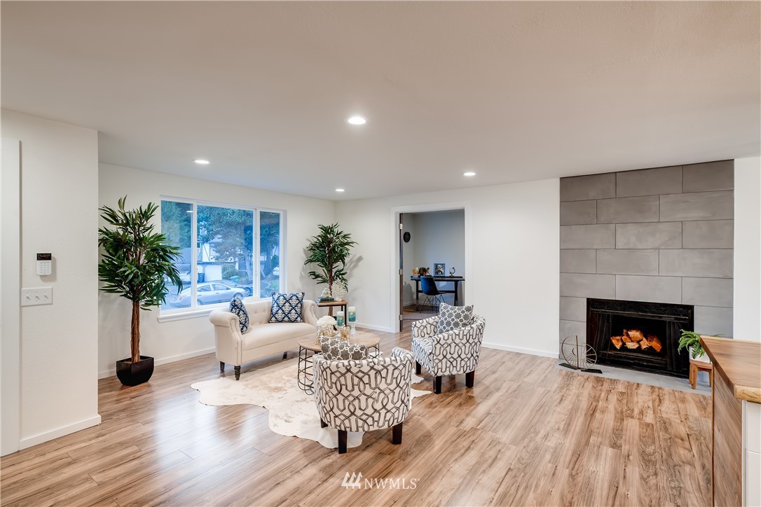 31404 3rd Place South Federal Way, WA 98003 - Photo 5 of 24 a living room with furniture and a fireplace