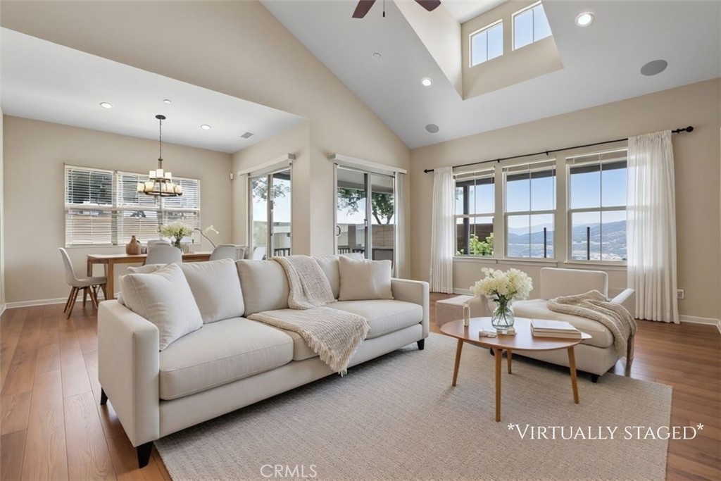 Light and bright great room. (Virtually staged)