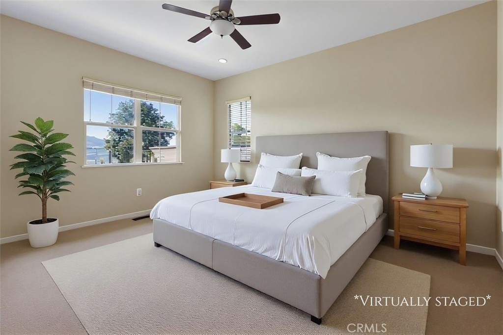 65 Listo Street Rancho Mission Viejo, CA 92694 - Photo 17 of 67 Spacious bedroom suite with ceiling fan. (Virtually staged)
