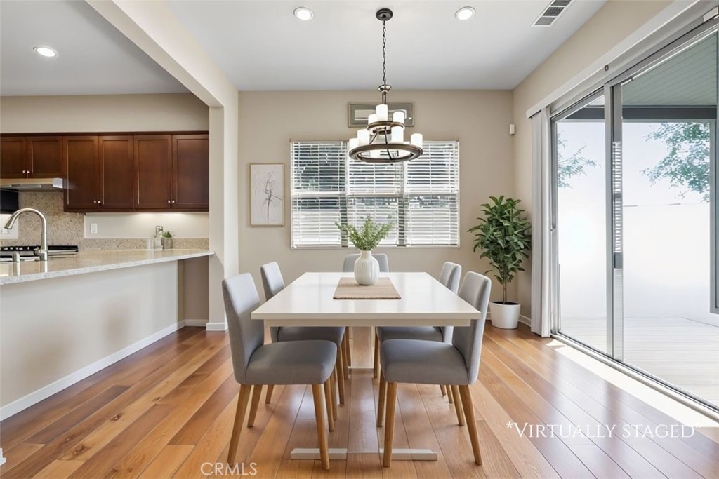 65 Listo Street Rancho Mission Viejo, CA 92694 - Photo 6 of 67 Light and bright dining area facing view. (Virtually staged)