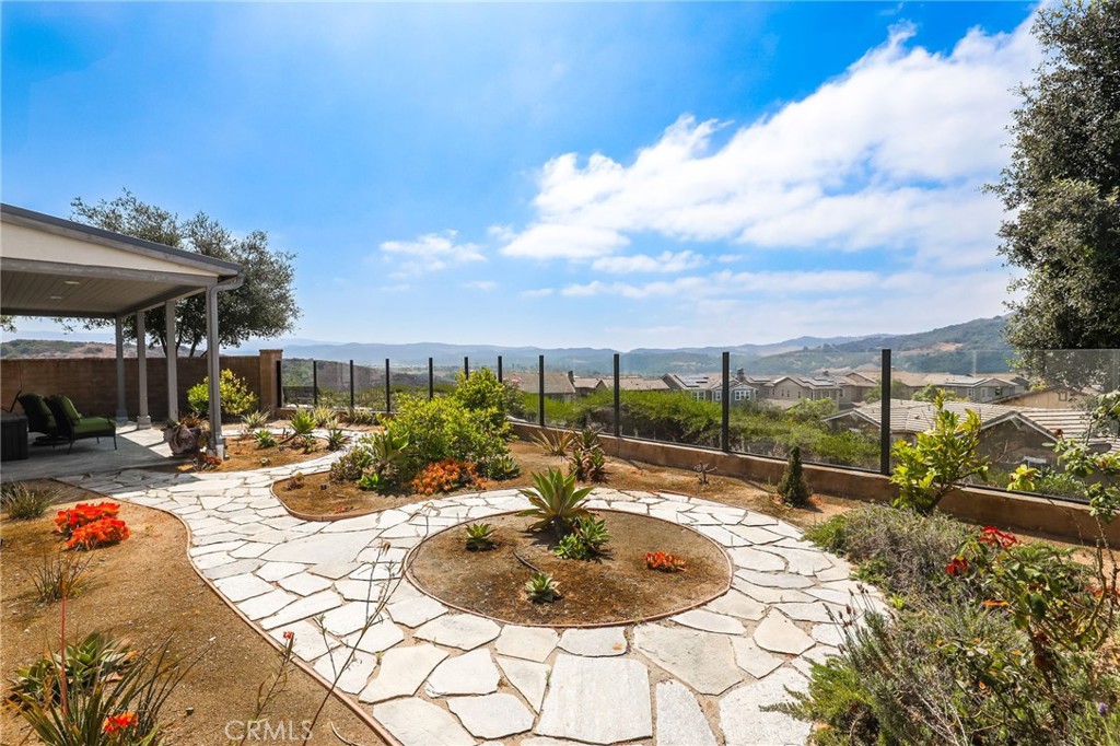 65 Listo Street Rancho Mission Viejo, CA 92694 - Photo 9 of 67 Low-care landscaping with drought-tolerant plants