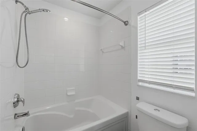 a outdoor living space with furniture and a potted plant