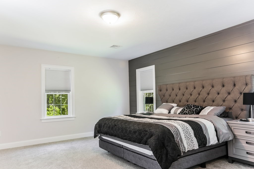 7 Station Street Kingston, MA 02364 - Photo 11 of 20 a bedroom with a bed and window