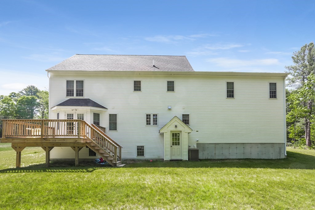 7 Station Street Kingston, MA 02364 - Photo 17 of 20 a front view of a house with a yard