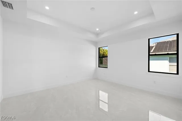 an empty room with windows