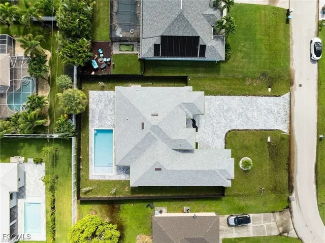 an aerial view of a house with a garden