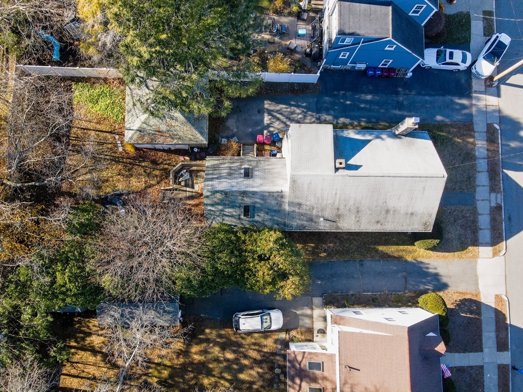 445 East Foster Street Melrose, MA 02176 - Photo 37 of 40 an aerial view of a house with a yard