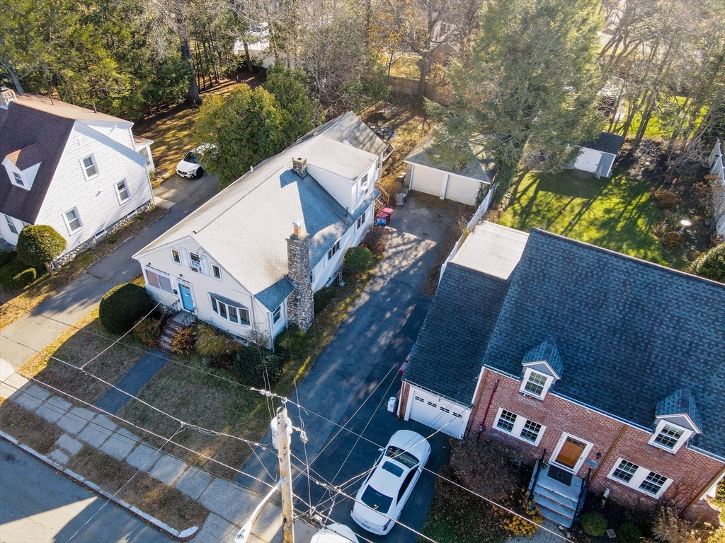 445 East Foster Street Melrose, MA 02176 - Photo 38 of 40 an aerial view of a house with a yard