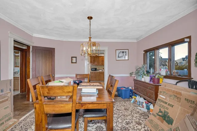 a kitchen with a sink cabinets and window