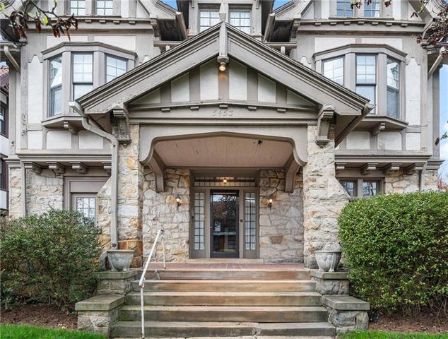 a view of a building with a window and balcony