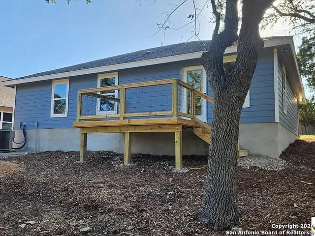 a house view with a sink and backyard