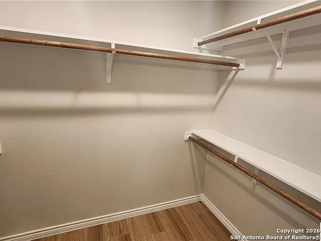 a view of small space with racks on the wall