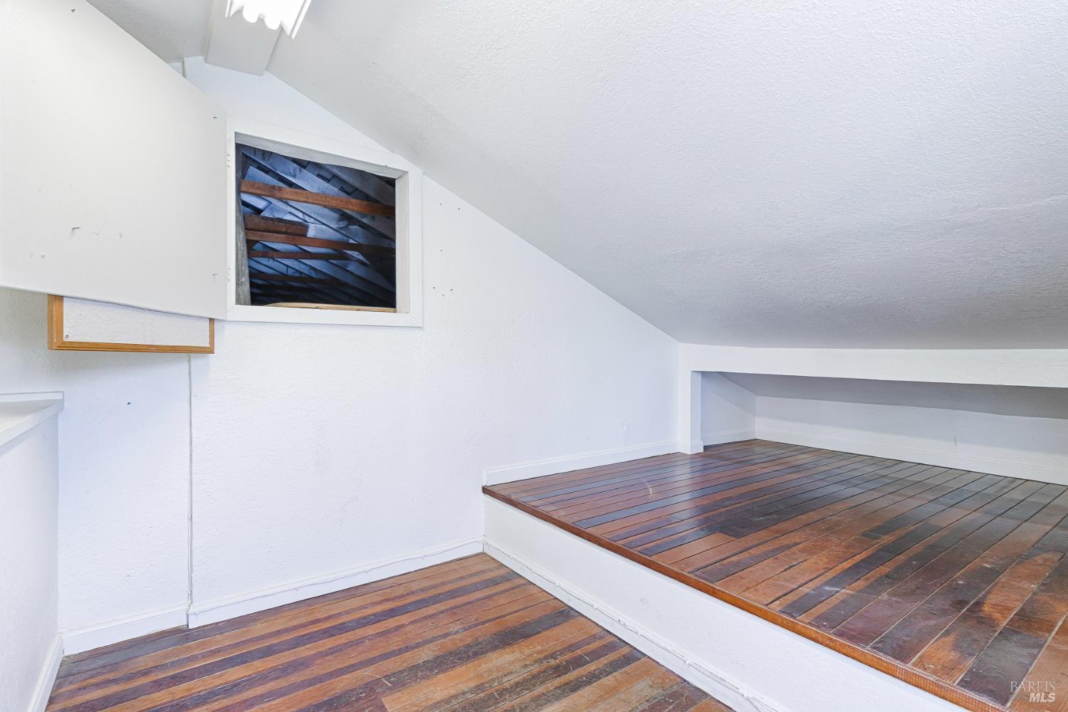 41 Meadow Avenue San Rafael, CA 94901 - Photo 29 of 55 Loft space above the garage. The attic crawl space access is open.