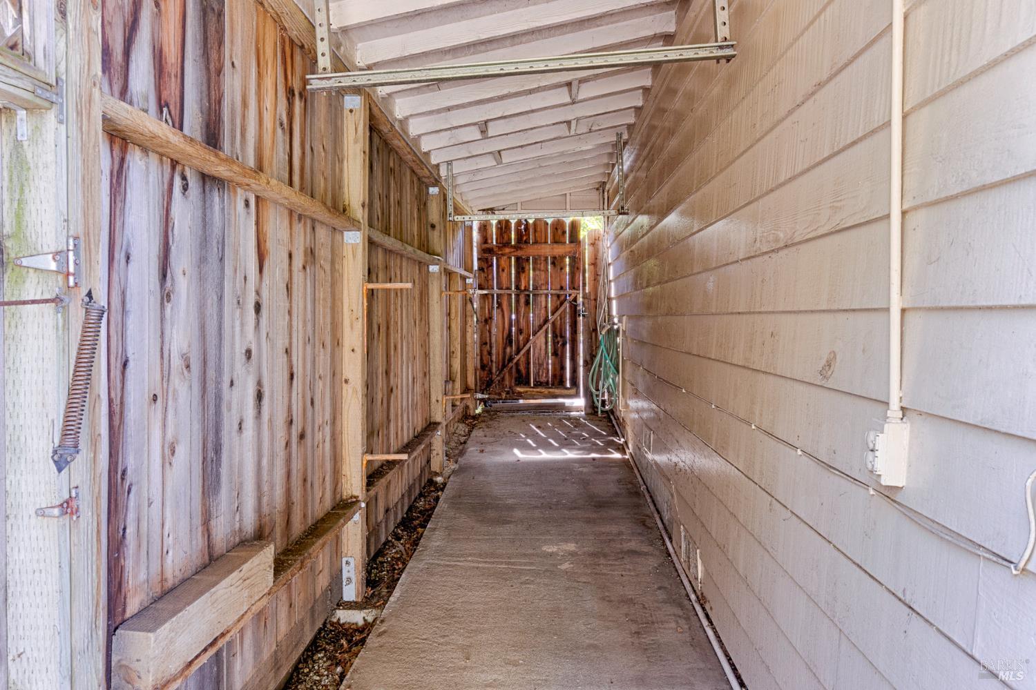 41 Meadow Avenue San Rafael, CA 94901 - Photo 54 of 55 Facing the house, this is the right side yard pass-through.
