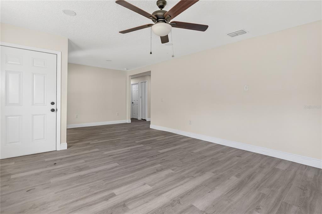 40415 Country Road Eustis, FL 32736 - Photo 23 of 39 wooden floor in an empty room