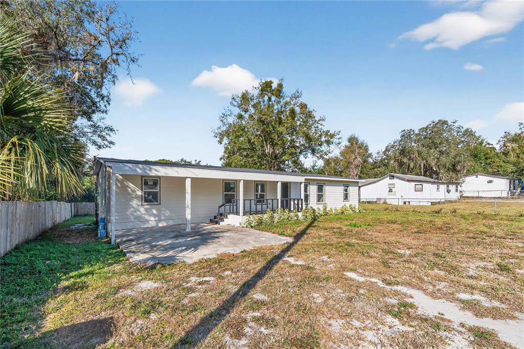 40415 Country Road Eustis, FL 32736 - Photo 4 of 39 a view of a house with a yard