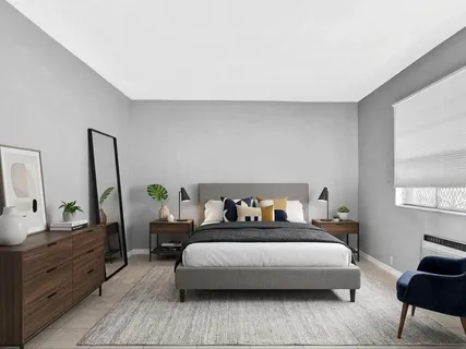 a bed room with a bed and a couch