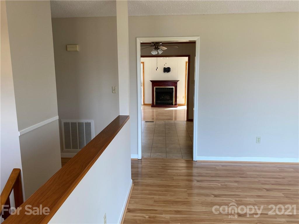 126 Burma Road West Marion, NC 28752 - Photo 18 of 29 a view of hallway with wooden floor
