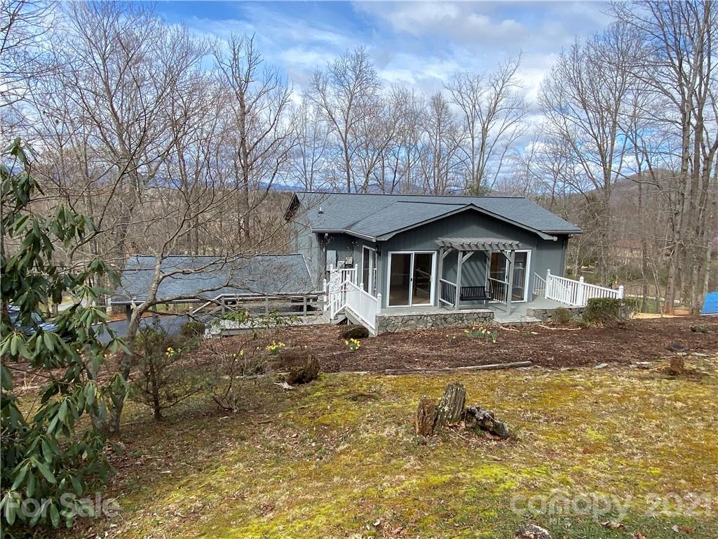126 Burma Road West Marion, NC 28752 - Photo 3 of 29 a view of house with a yard