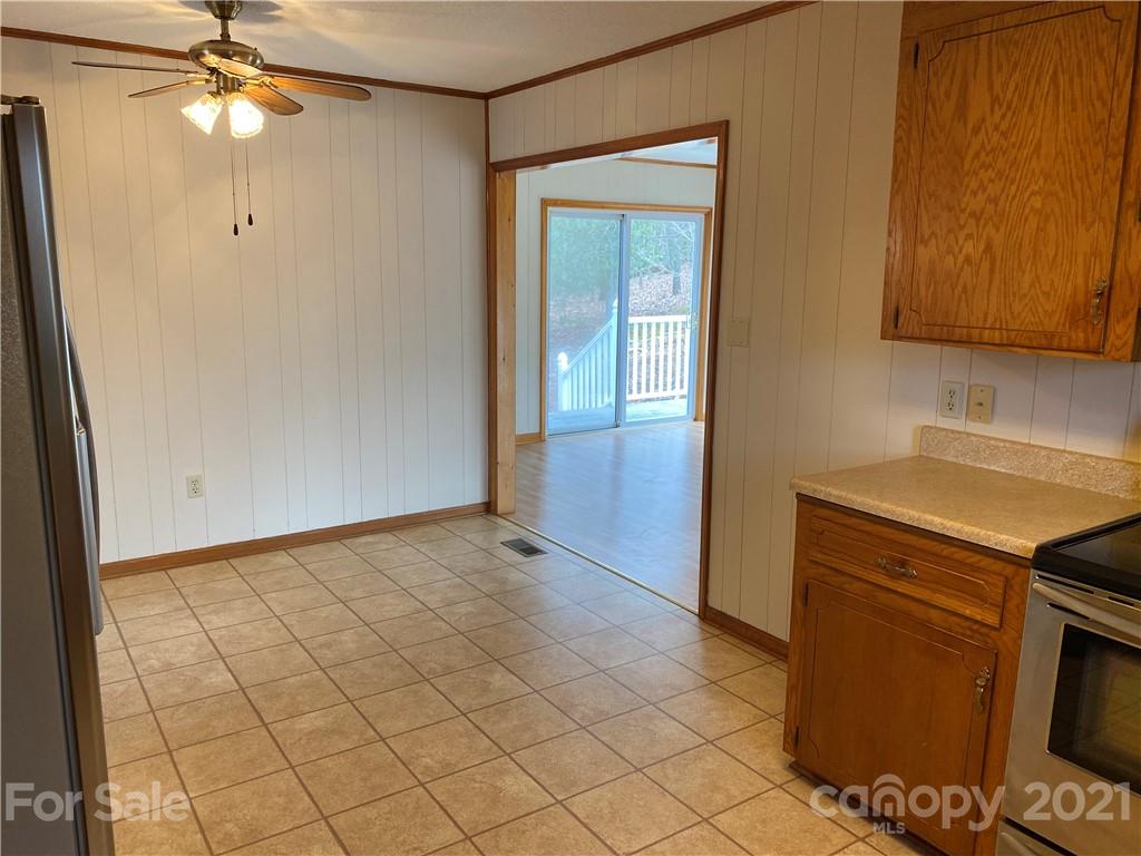 126 Burma Road West Marion, NC 28752 - Photo 23 of 29 a view of a kitchen with microwave and cabinets