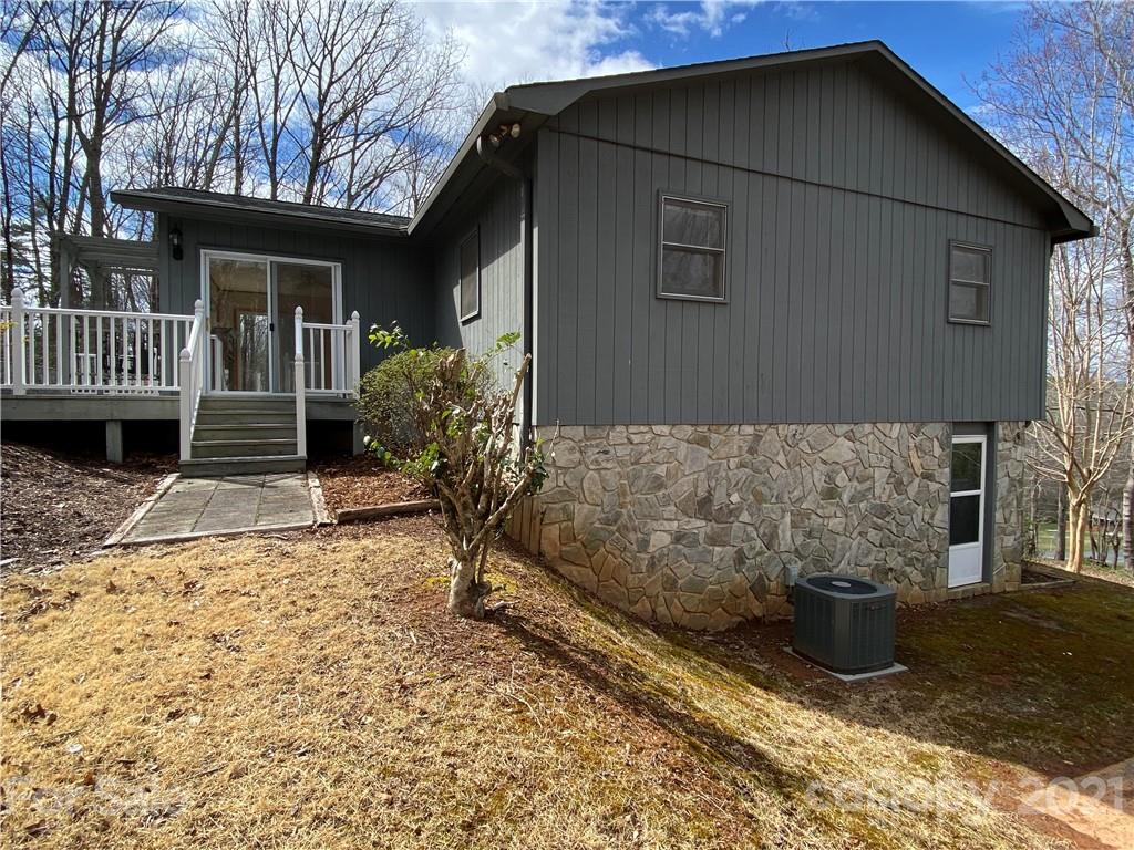 126 Burma Road West Marion, NC 28752 - Photo 6 of 29 a front view of a house with garden