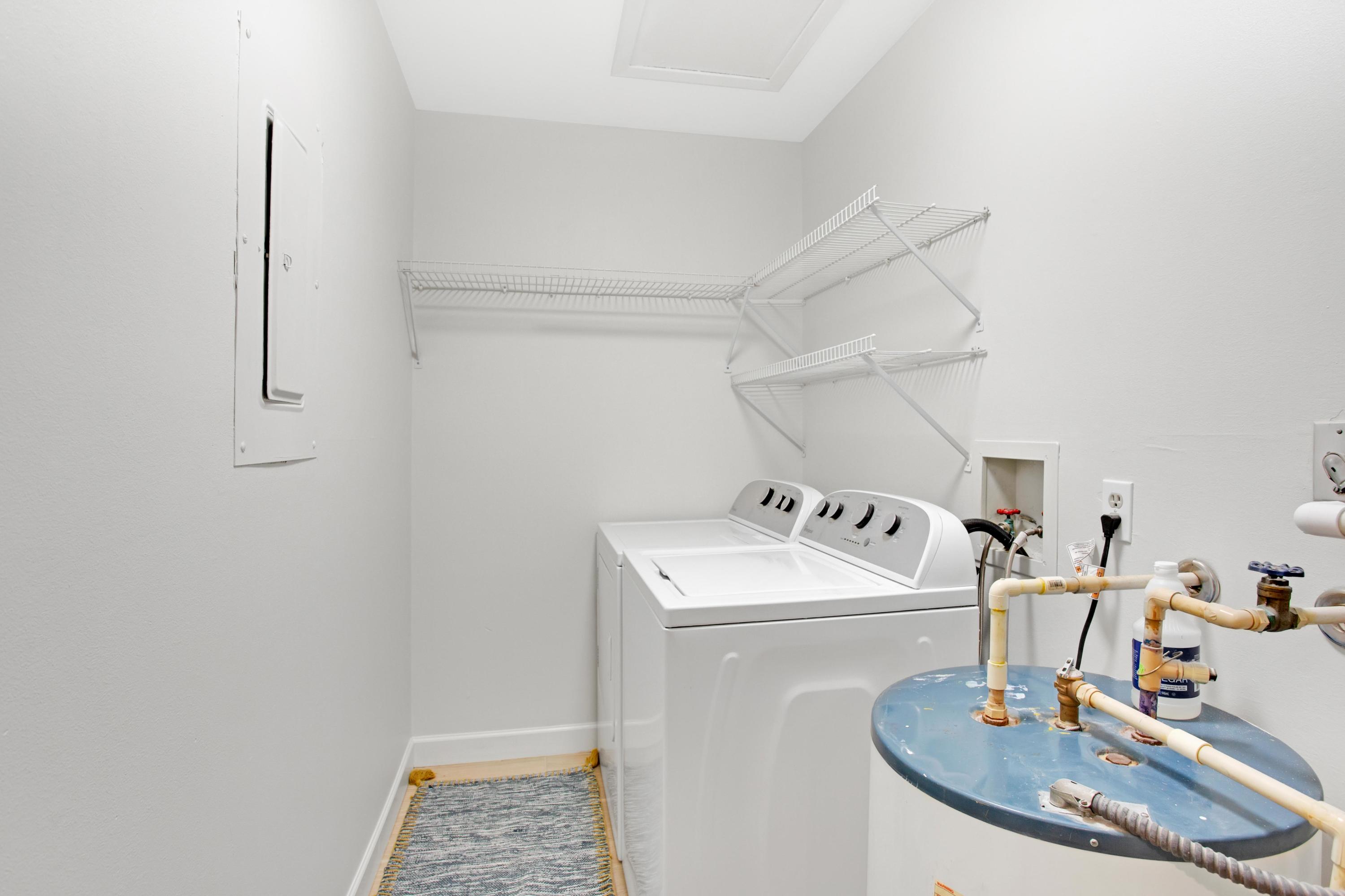 666 Bayou Drive, Unit 666 Miramar Beach, FL 32550 - Photo 13 of 24 a sink with a washer and dryer