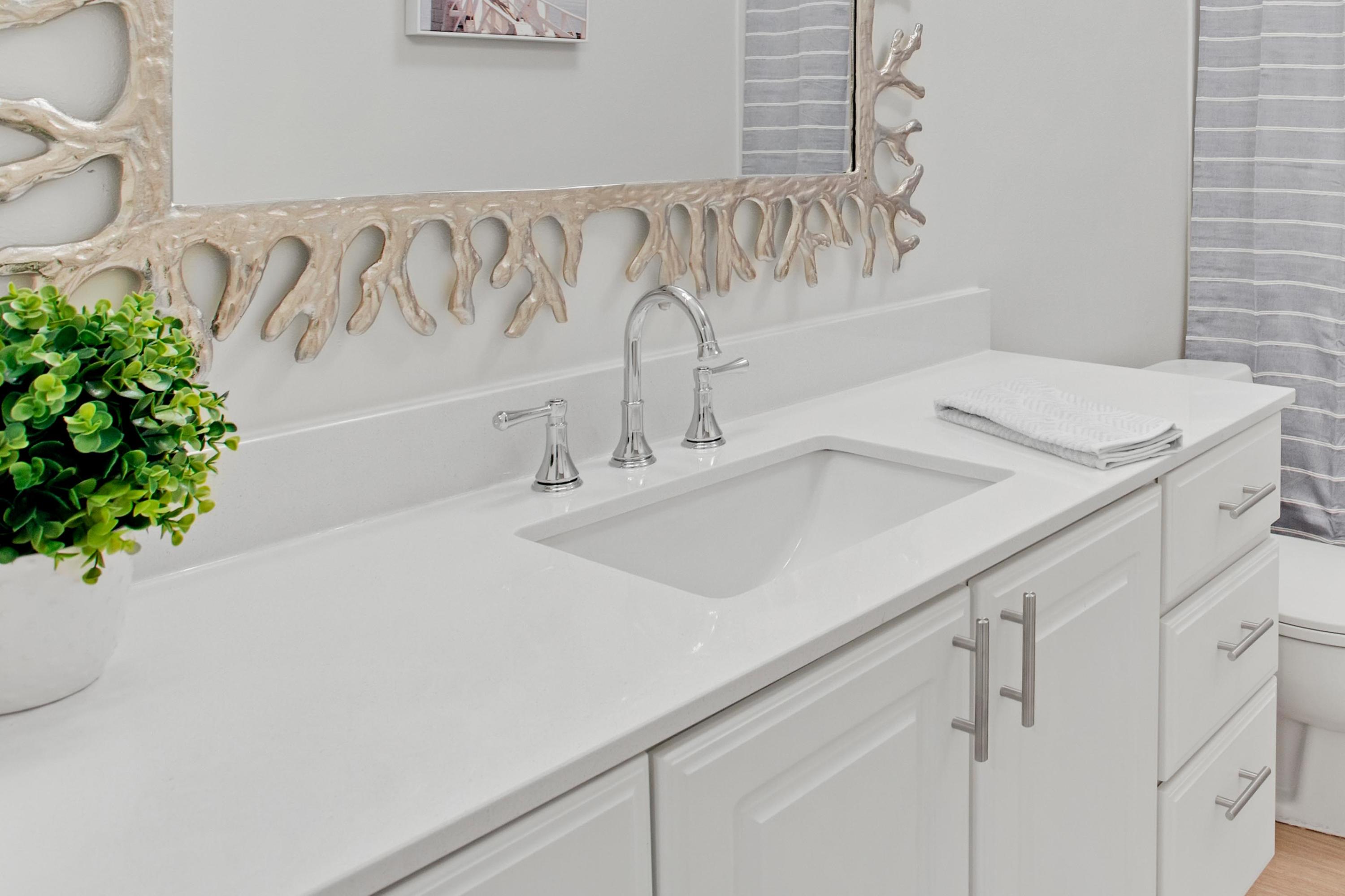 666 Bayou Drive, Unit 666 Miramar Beach, FL 32550 - Photo 15 of 24 a bathroom with a sink and a mirror