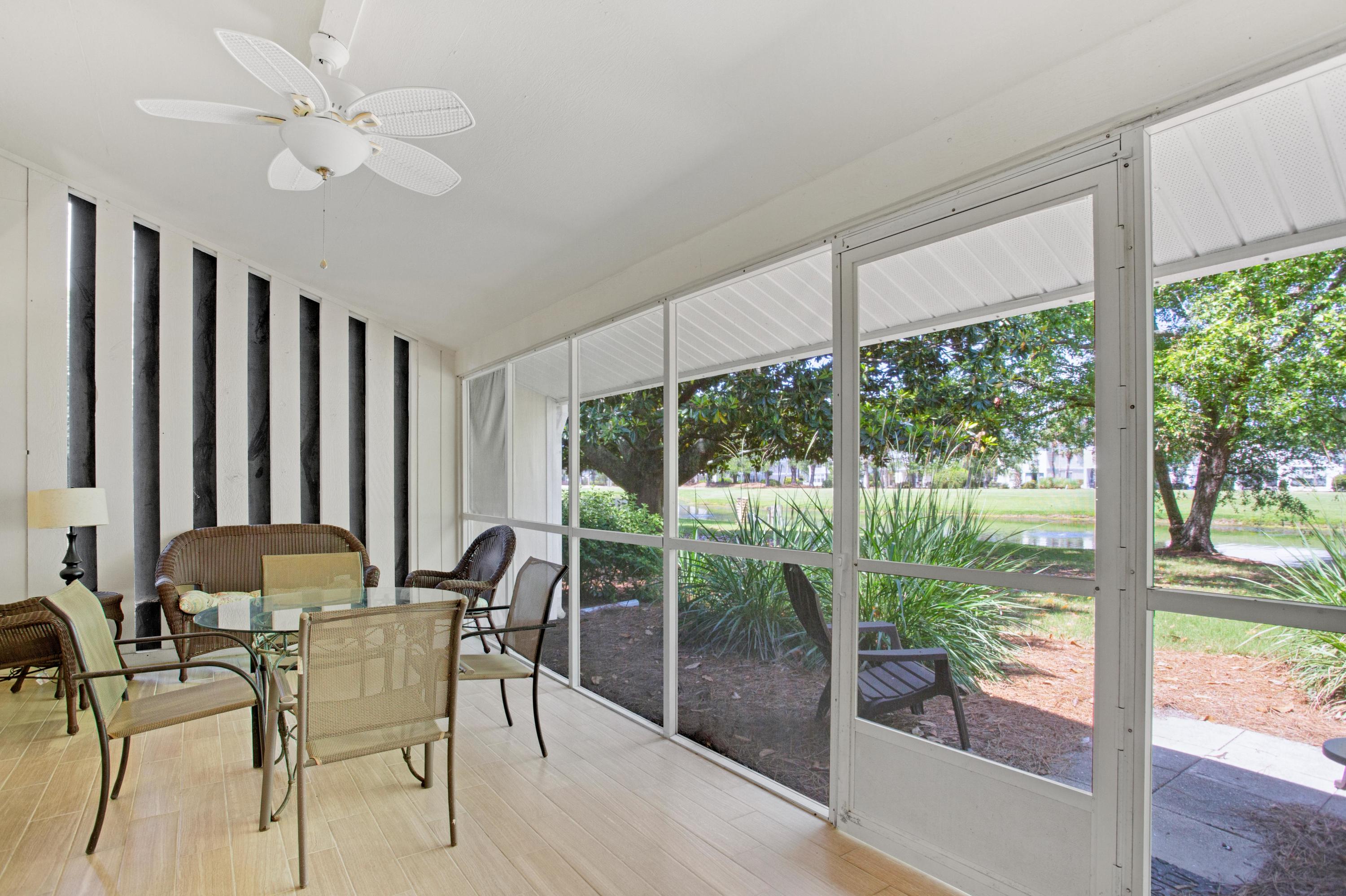666 Bayou Drive, Unit 666 Miramar Beach, FL 32550 - Photo 22 of 24 a view of a dining room with furniture window and outside view