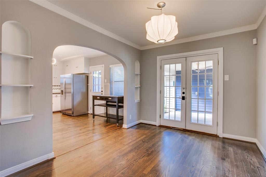 2051 Marydale Road Dallas, TX 75208 - Photo 13 of 30 a view of a livingroom with furniture wooden floor and windows