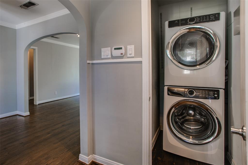 2051 Marydale Road Dallas, TX 75208 - Photo 19 of 30 a view of a hallway with washer and dryer