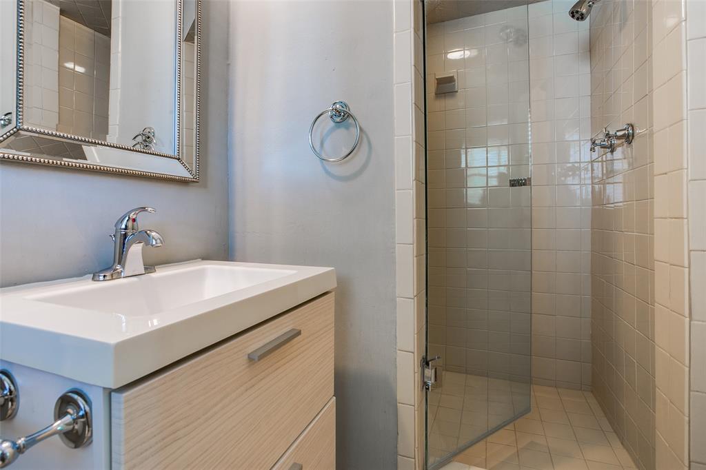 2051 Marydale Road Dallas, TX 75208 - Photo 26 of 30 a bathroom with a sink and mirror