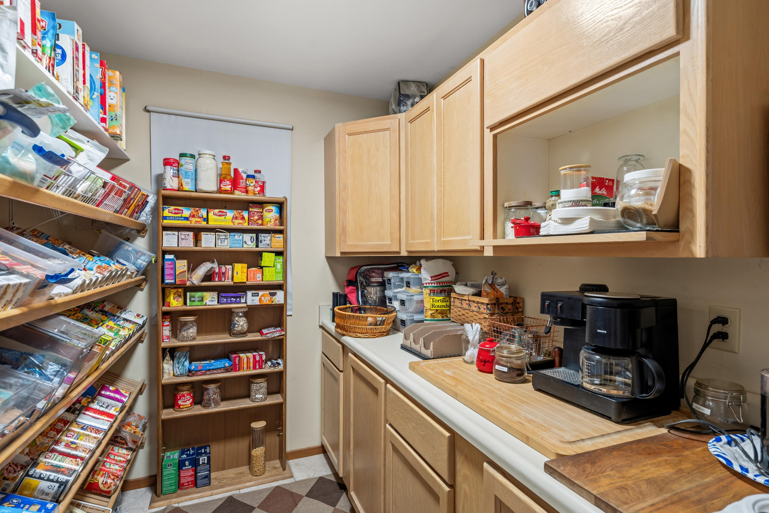 3268 Humbug Creek Road Jacksonville, OR 97530 - Photo 12 of 36 a room with fridge and wooden floor