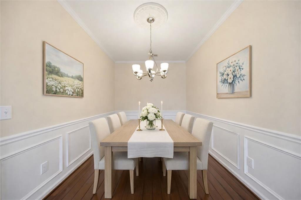 111 Stonegate Lane Canton, GA 30114 - Photo 7 of 30 a view of a dining room with furniture and wooden floor