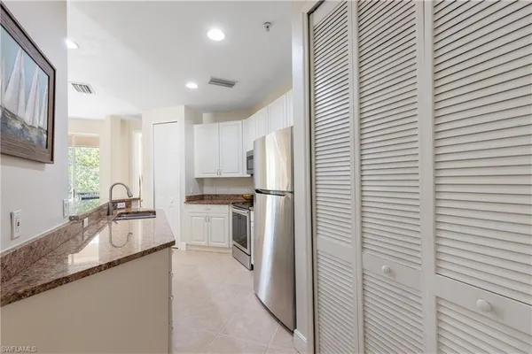 $279,000 | 1380 Sweetwater Cove, Unit 203, Naples, FL 34110