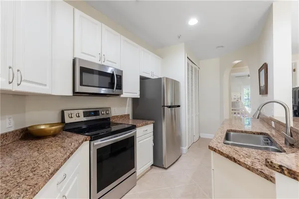 $279,000 | 1380 Sweetwater Cove, Unit 203, Naples, FL 34110