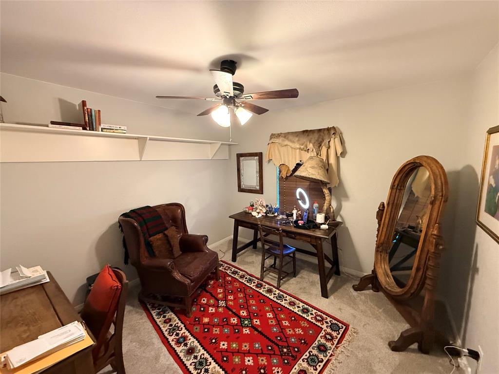 351 Bosque Bend Lane China Spring, TX 76633 - Photo 14 of 39 a living room with furniture a rug and a chandelier