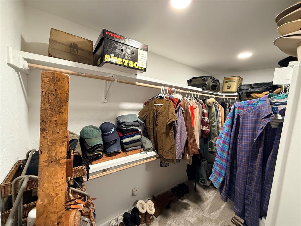 351 Bosque Bend Lane China Spring, TX 76633 - Photo 20 of 39 a view of walk in closet with clothes and shoes