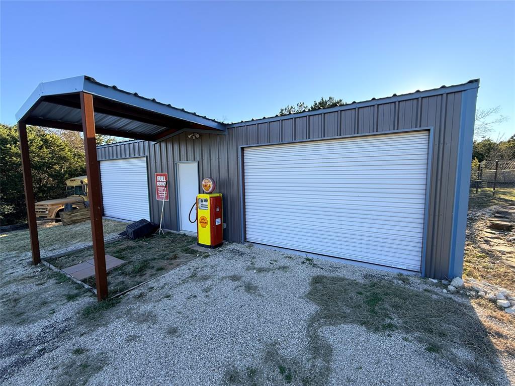 351 Bosque Bend Lane China Spring, TX 76633 - Photo 33 of 39 a view of a wooden house with a sink and wooden fence