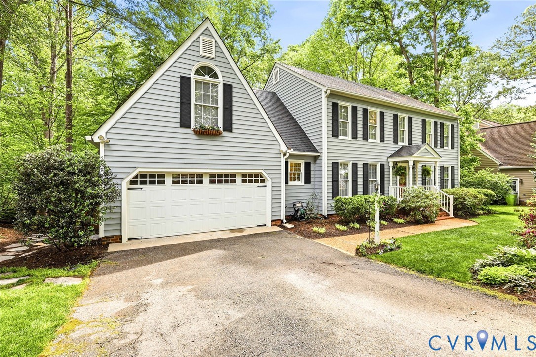 14310 Huntgate Woods Road Midlothian, VA 23112 - Photo 3 of 46 Double-width paved driveway