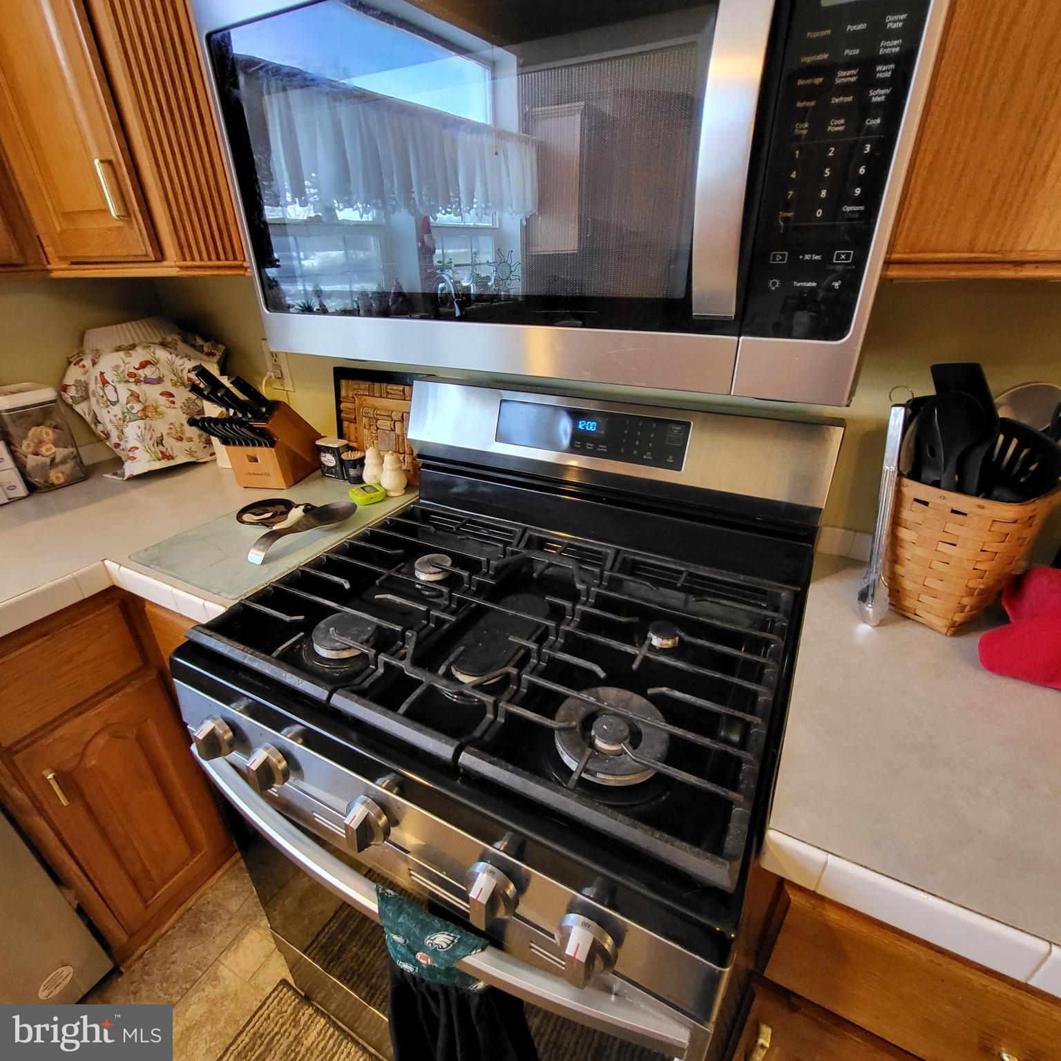21571 Path Valley Road Dry Run, PA 17220 - Photo 20 of 63 a stove top oven sitting inside of a kitchen