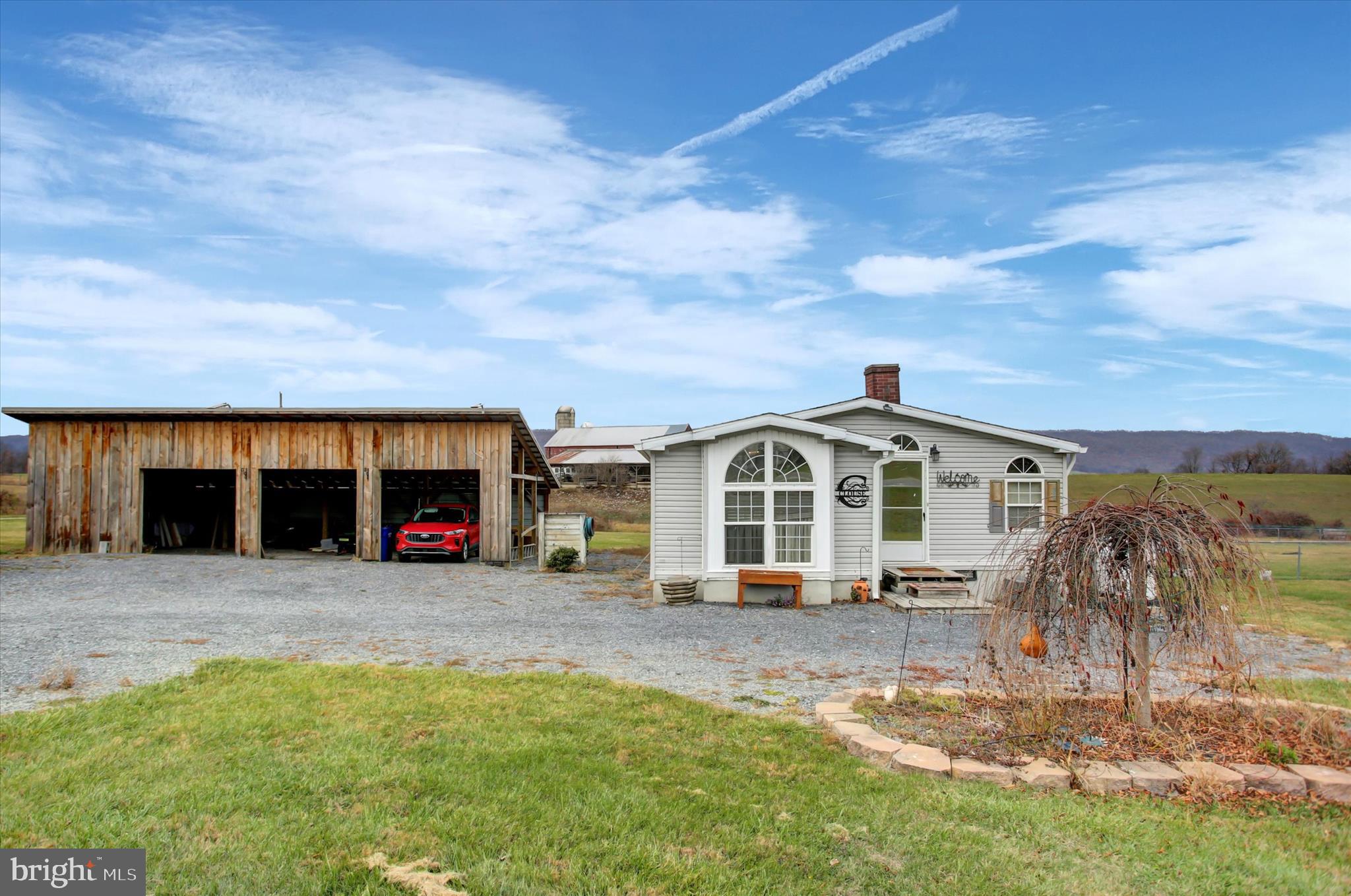 21571 Path Valley Road Dry Run, PA 17220 - Photo 2 of 63 a view of a house with a patio