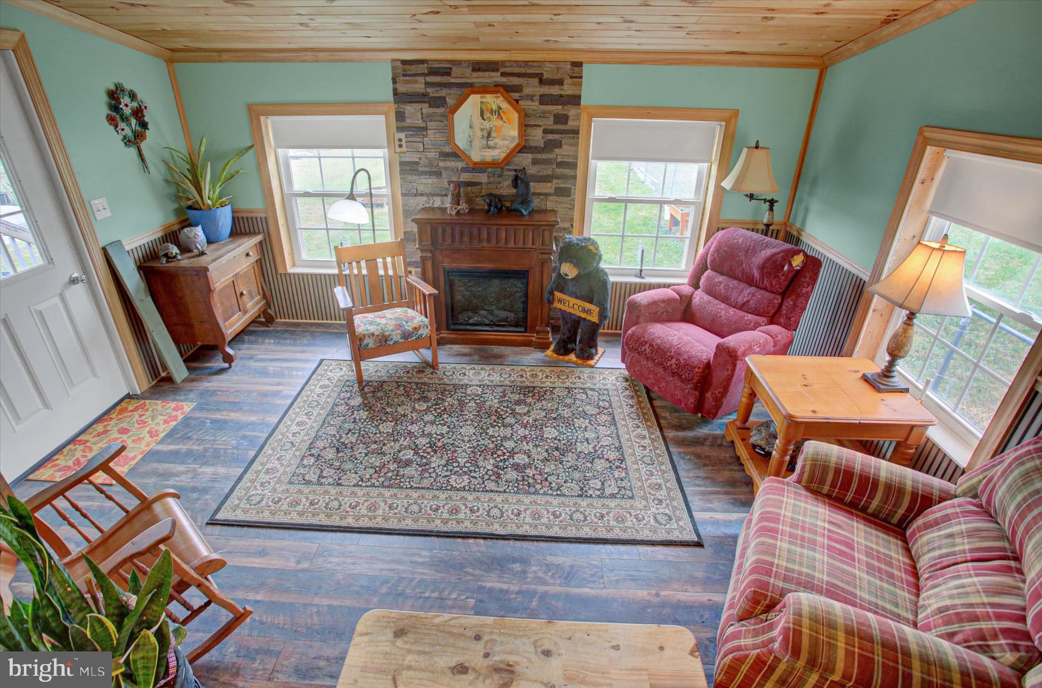 21571 Path Valley Road Dry Run, PA 17220 - Photo 27 of 63 a living room with furniture and a fireplace