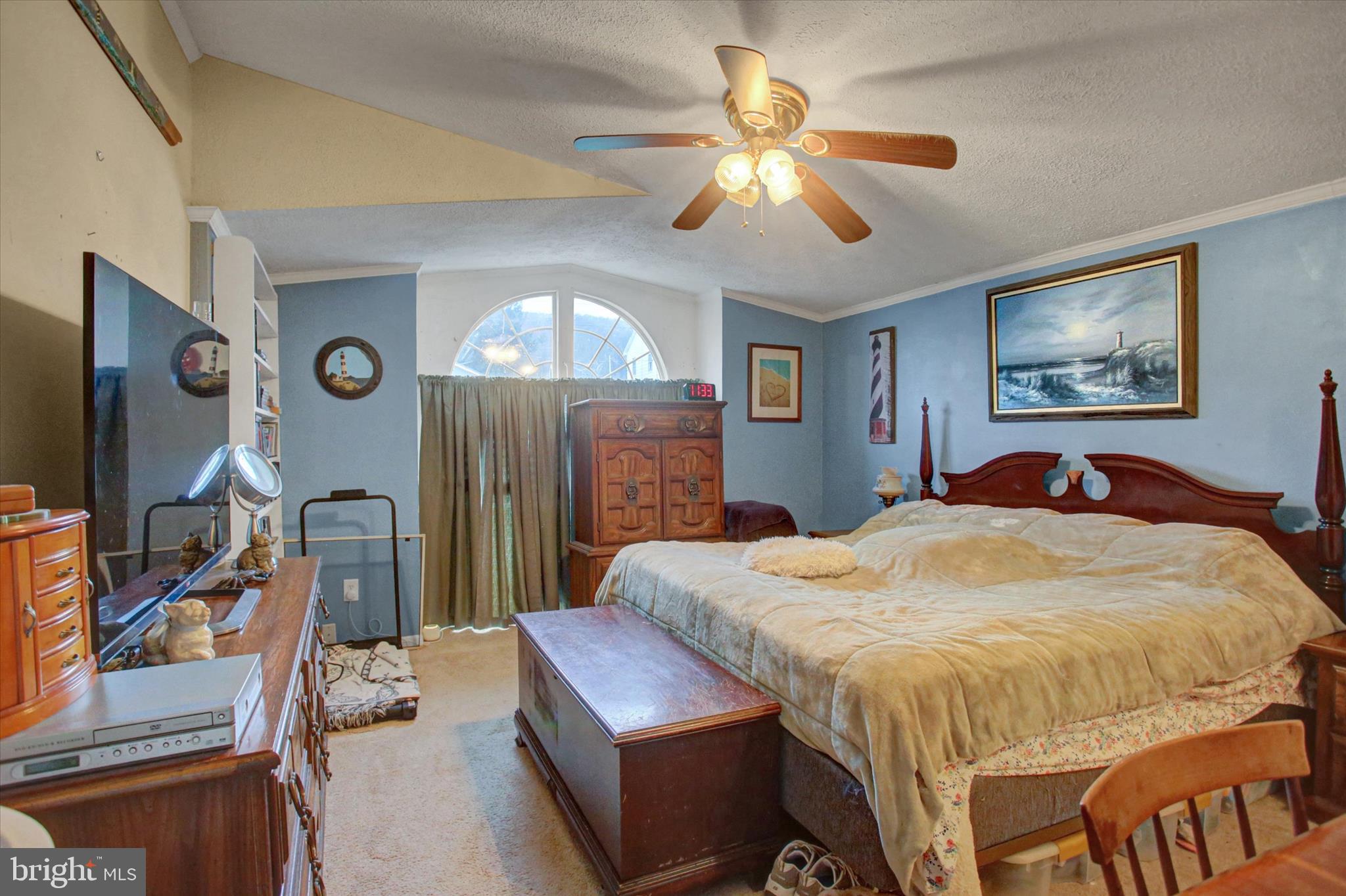 21571 Path Valley Road Dry Run, PA 17220 - Photo 29 of 63 a bedroom with a bed and a flat screen tv